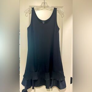 Black satin DKNY shift dress with double ruffle at hem.
